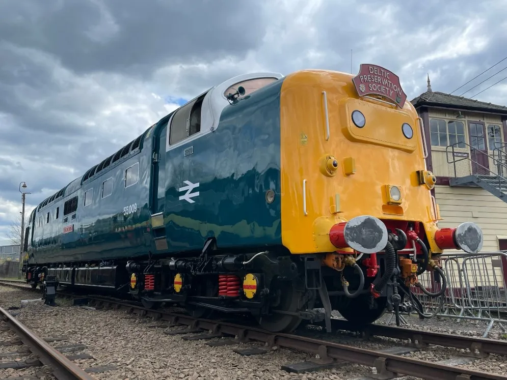 a train that is sitting on a railroad track