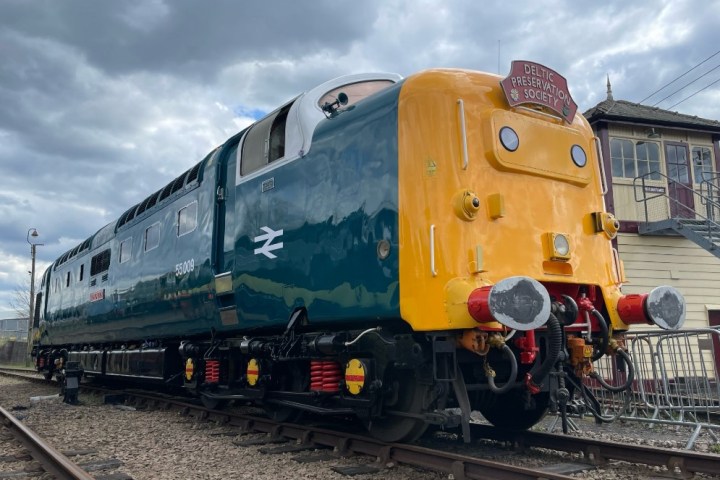 a train that is sitting on a railroad track