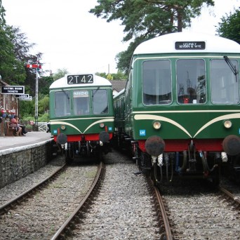 a group of people on a train track