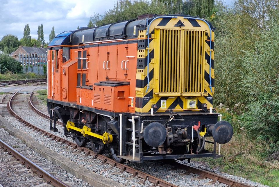 a large long train on a steel track